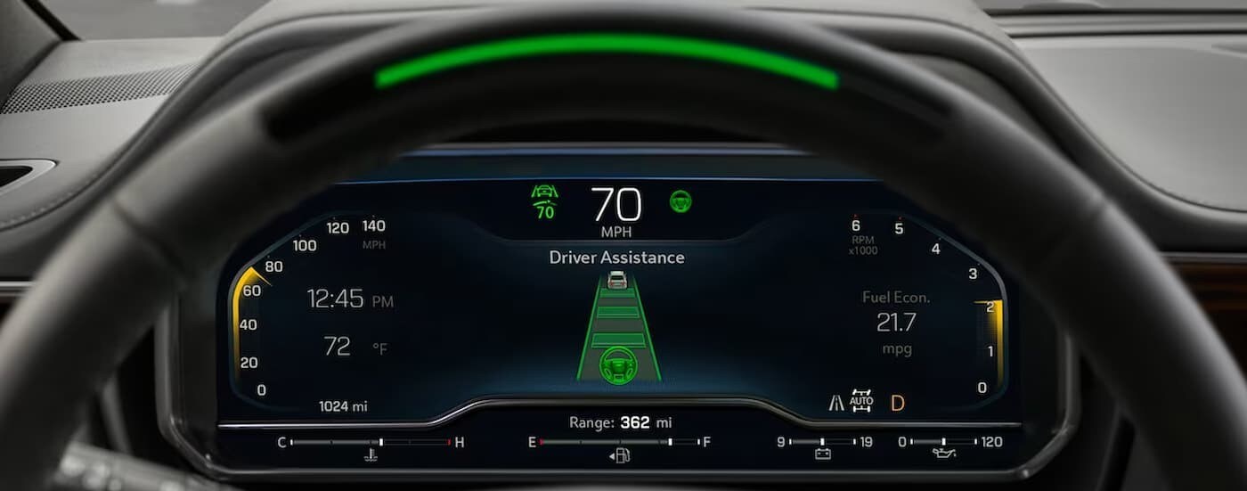 The digital dash in a 2024 Chevy Tahoe is shown.