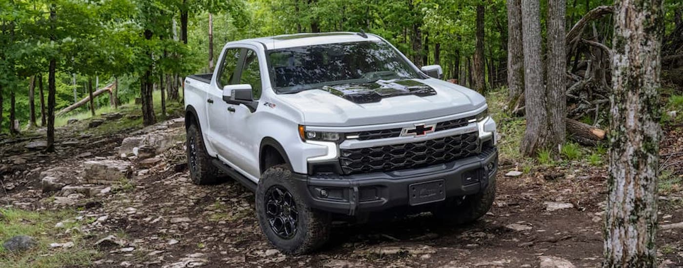 A white 2023 Chevy Silverado ZR2 Bison is shown from the front at an angle.
