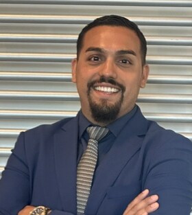 Staff member Oscar Alvarado from ID_324669