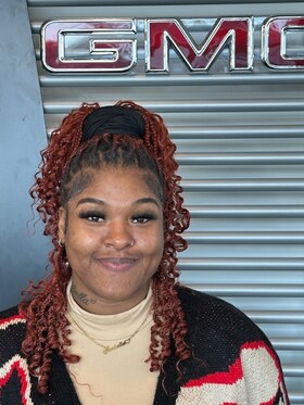 Staff member Arjanay Long from ID_5fb5c55d8ecf