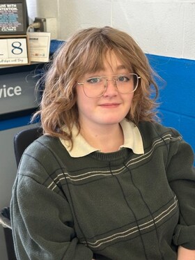 Staff member Quinn Kimberley from ID_e029b842d813