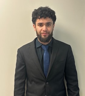 Staff member Mohammad Hashimi from ID_2ef19f8d6382