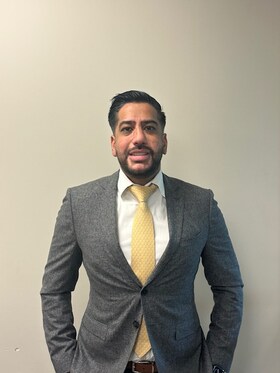 Staff member Krish Dinali from ID_ea7328e70feb