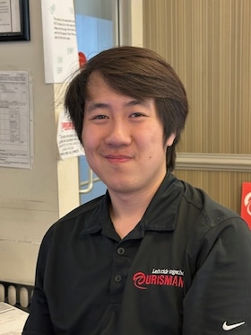 Staff member Kevin Hua from ID_f6655a1552a8