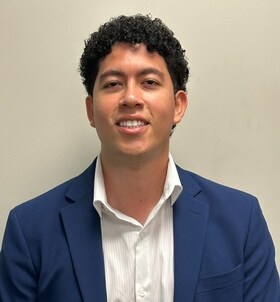 Staff member Alex Guzman from ID_2ef19f8d6382