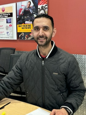 Staff member Mustafa Toghral from ID_f6655a1552a8