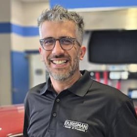 Staff member John Konstandinidis from dd7ea513bc13