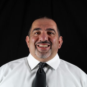 Staff member Nicholas Nicolau from fc116bdef9ba