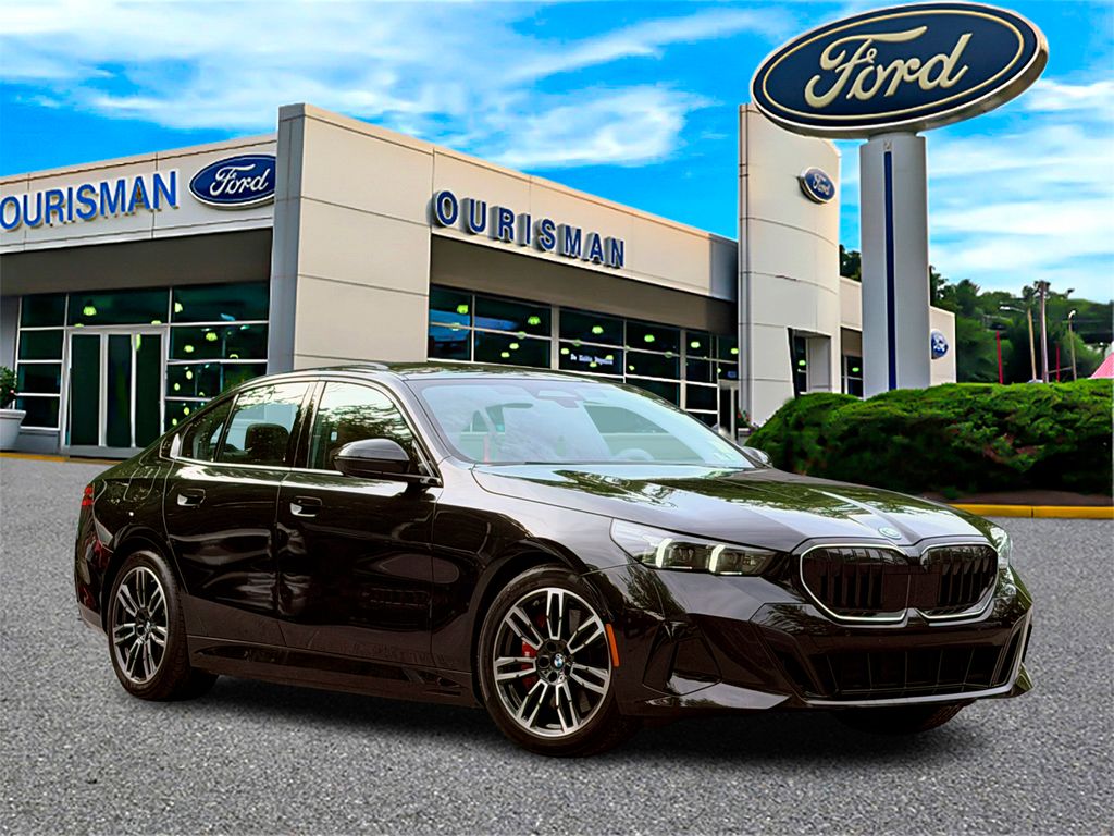 2026 BMW 5 Series 550e xDrive Sedan's photo