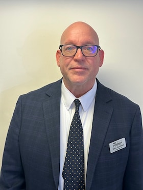 Staff member John Schmied from ID_108d783532a7