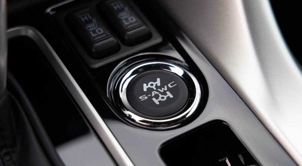 Close-up of the S-AWC button in a 2023 Mitsubishi Eclipse Cross.