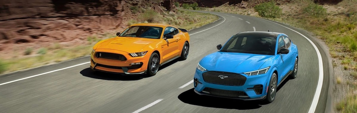 Two 2023 Ford Mustang driving
