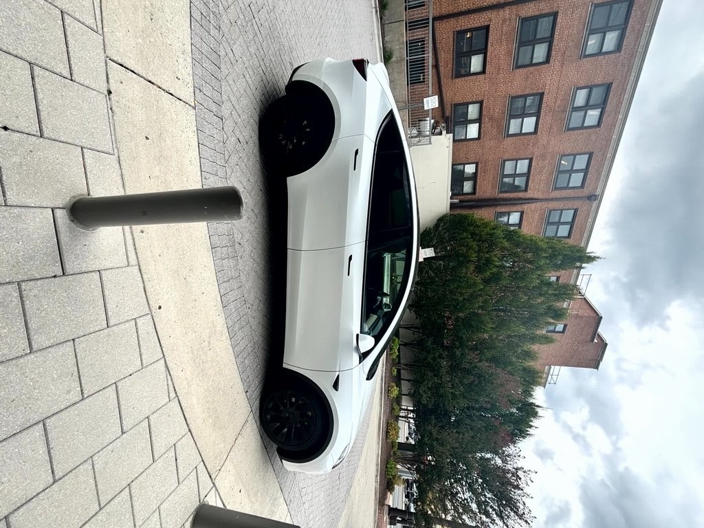 Used 2021 Tesla Model Y Long Range with VIN 5YJYGDEE8MF065972 for sale in Bethesda, MD