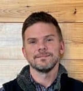 Staff member JOSH BELLUE from ID_4d7869fd8405