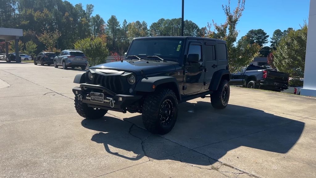 Used 2016 Jeep Wrangler Unlimited Sport with VIN 1C4BJWDG4GL198736 for sale in Oxford, MS