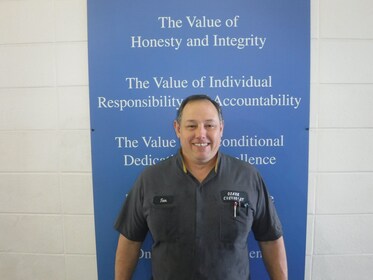 Staff member TOM from fb780cb29ec0