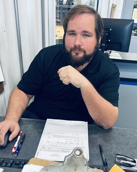 Staff member AARON from fb780cb29ec0