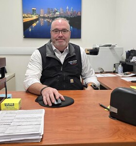 Staff member Larry Braun from ID_89d014