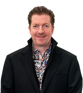 Staff member John Hrad from e088a26938ef