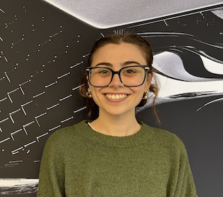 Staff member Eliza D'Amico from ID_9d9d4a