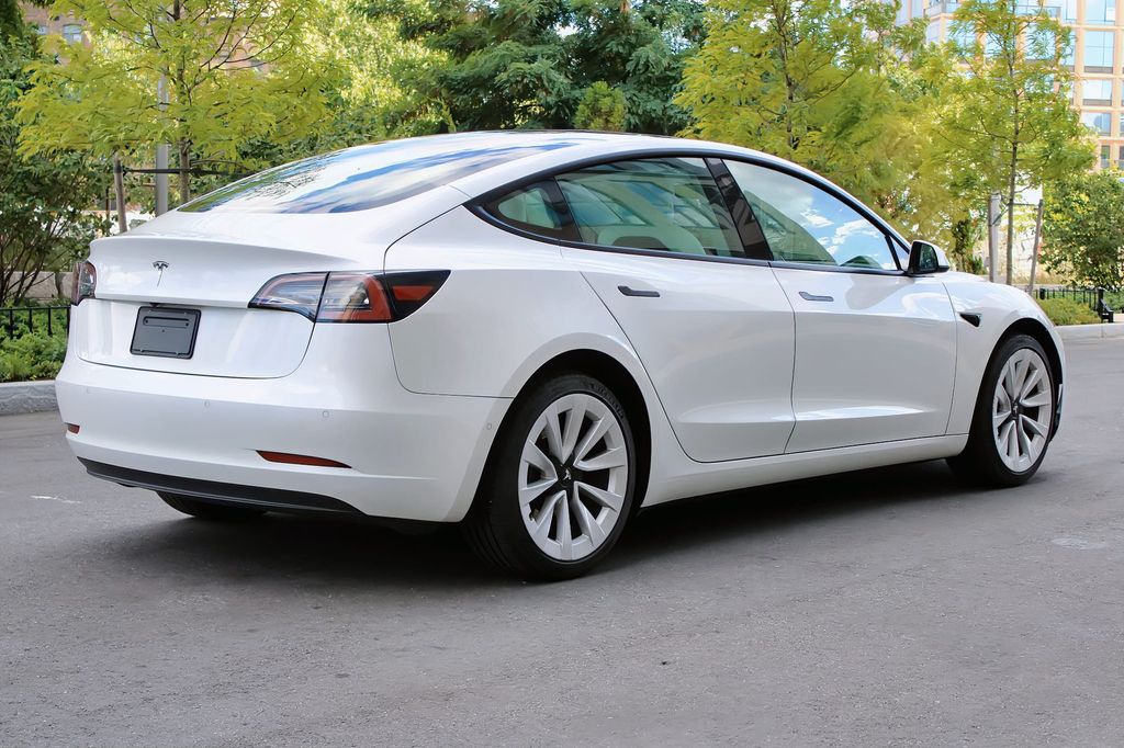 Used 2022 Tesla Model 3 Base with VIN 5YJ3E1EA3NF322114 for sale in West Palm Beach, FL