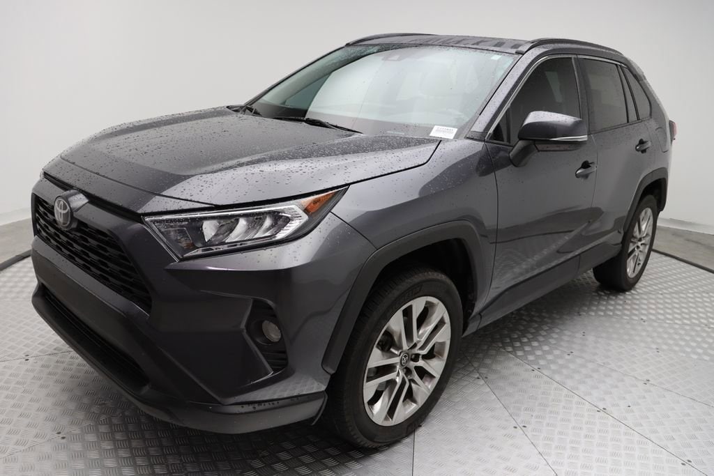 Used 2021 Toyota RAV4 XLE Premium with VIN 2T3C1RFV3MC171037 for sale in West Palm Beach, FL