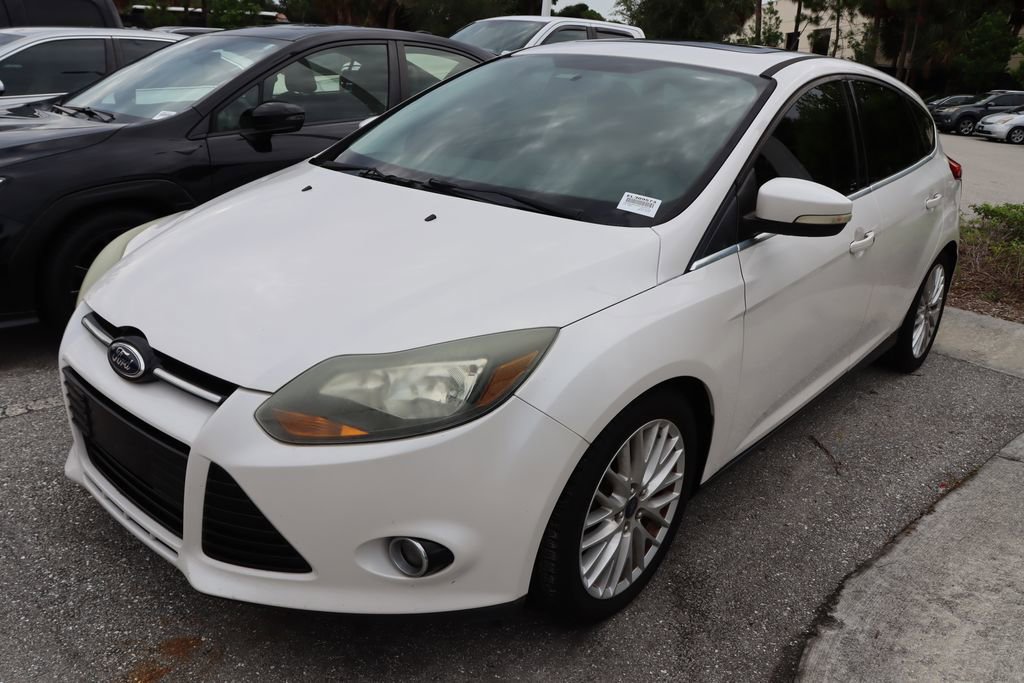 Used 2014 Ford Focus Titanium with VIN 1FADP3N26EL309573 for sale in West Palm Beach, FL