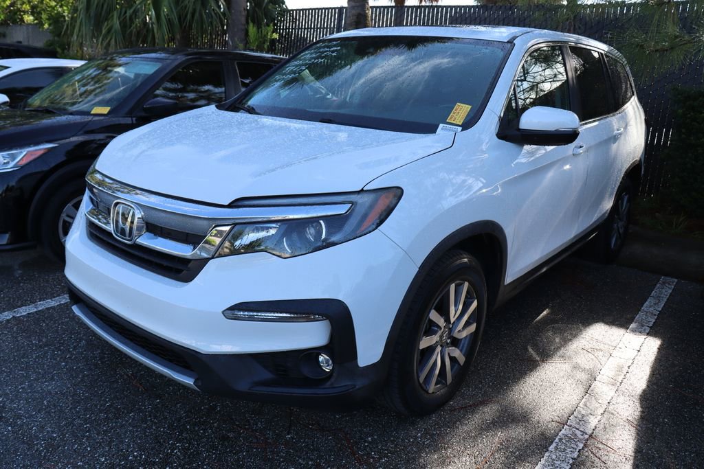 Used 2021 Honda Pilot EX-L with VIN 5FNYF5H52MB010244 for sale in West Palm Beach, FL