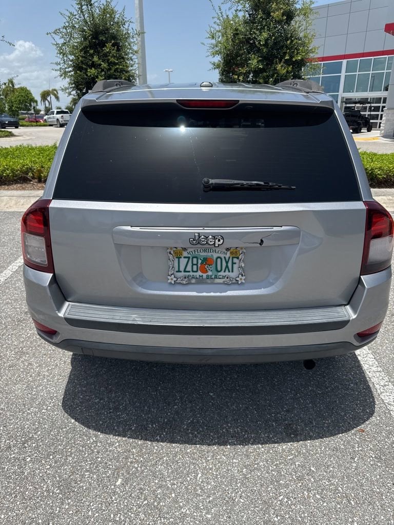 Used 2017 Jeep Compass Sport with VIN 1C4NJCBA1HD123515 for sale in West Palm Beach, FL