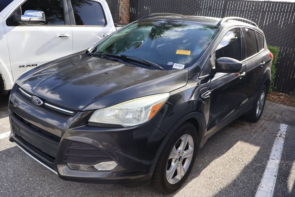 Used 2016 Ford Escape SE with VIN 1FMCU0GX3GUC08862 for sale in West Palm Beach, FL