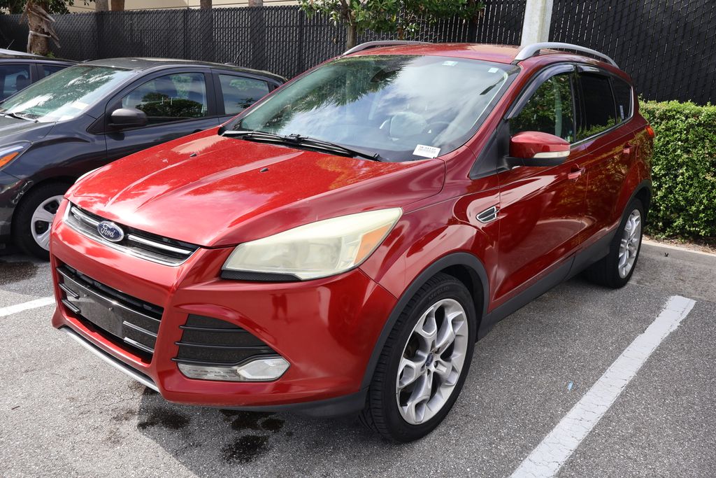 Used 2014 Ford Escape Titanium with VIN 1FMCU0J90EUE34137 for sale in West Palm Beach, FL