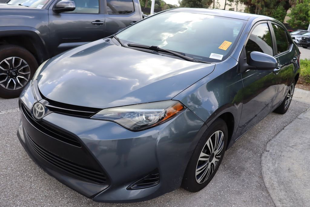 Used 2018 Toyota Corolla LE with VIN 5YFBURHE0JP808941 for sale in West Palm Beach, FL