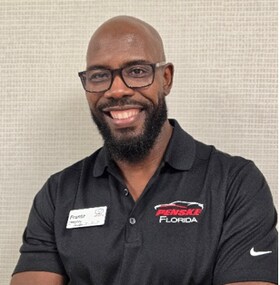 Staff member Frantz Deralus from ID_9d6c47eaafdc