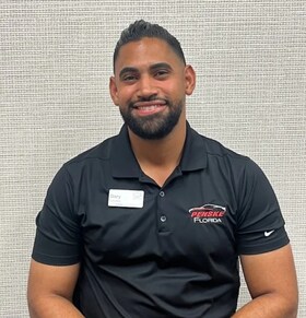 Staff member Dary Liriano from ID_9d6c47eaafdc
