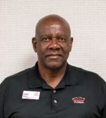 Staff member Jean Albert from ID_9d6c47eaafdc