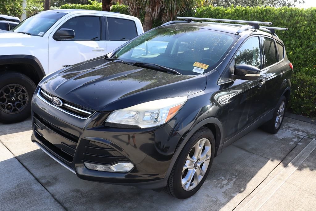 Used 2014 Ford Escape Titanium with VIN 1FMCU0JXXEUC73259 for sale in West Palm Beach, FL