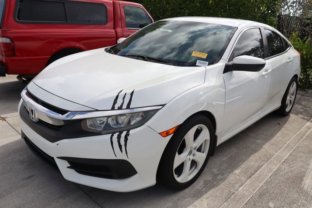 Used 2017 Honda Civic LX with VIN 19XFC2F56HE010292 for sale in West Palm Beach, FL