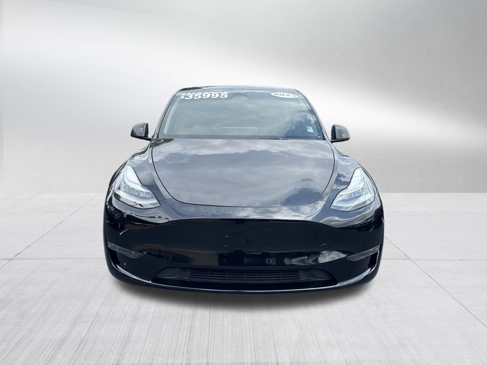 Used 2023 Tesla Model Y Long Range with VIN 7SAYGDEE1PA045499 for sale in Roswell, GA