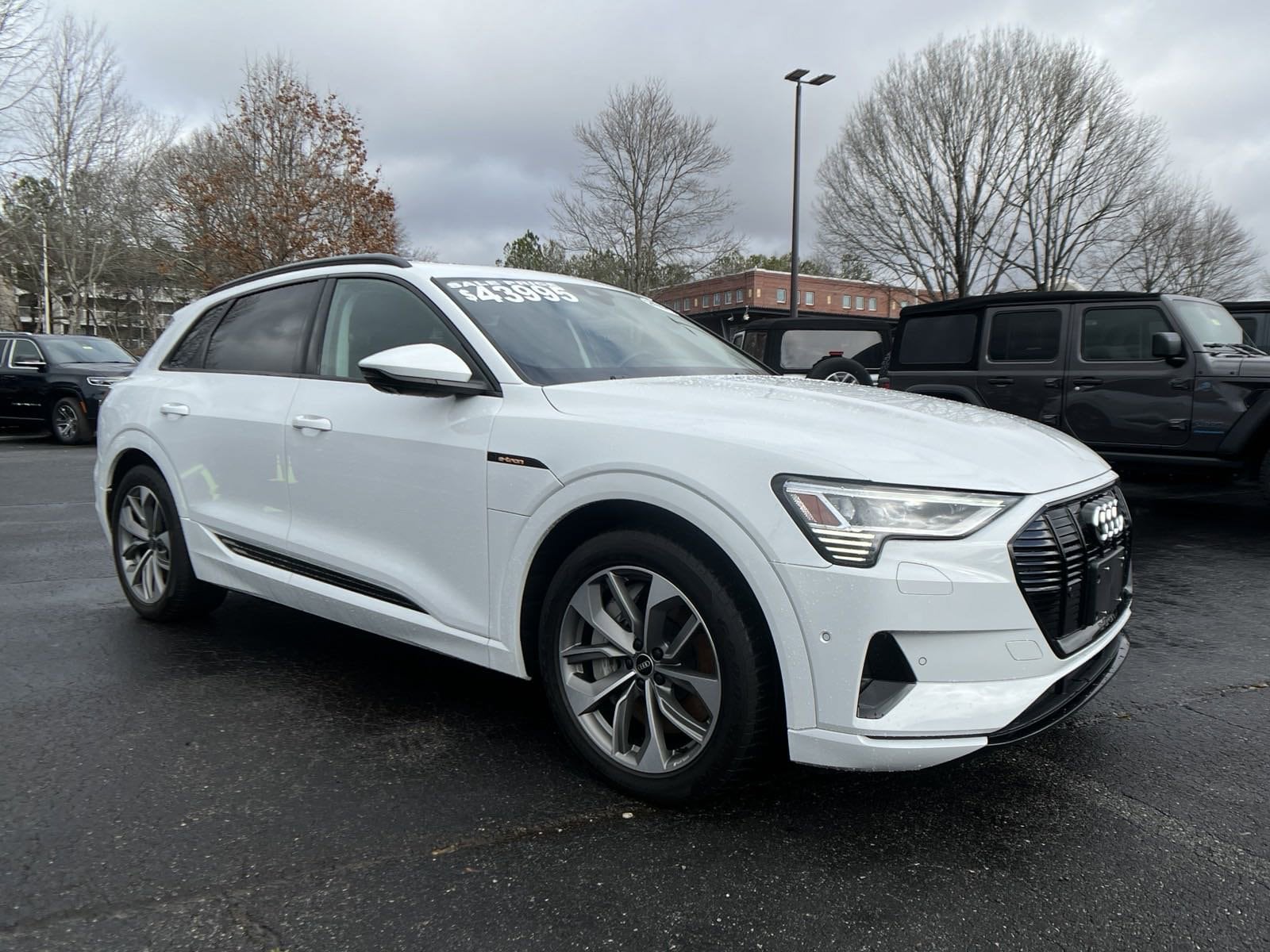 Used 2021 Audi e-tron Premium Plus with VIN WA1LAAGE8MB009681 for sale in Roswell, GA