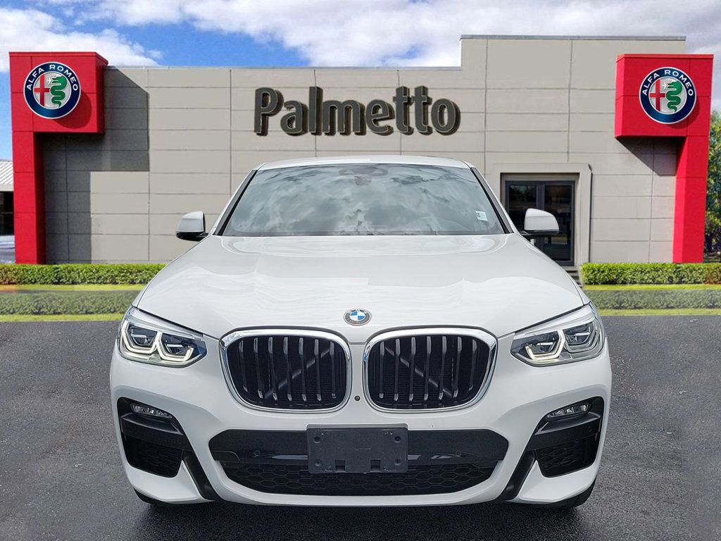 Used 2021 BMW X4 30i with VIN 5UX2V1C03M9H97164 for sale in Miami, FL