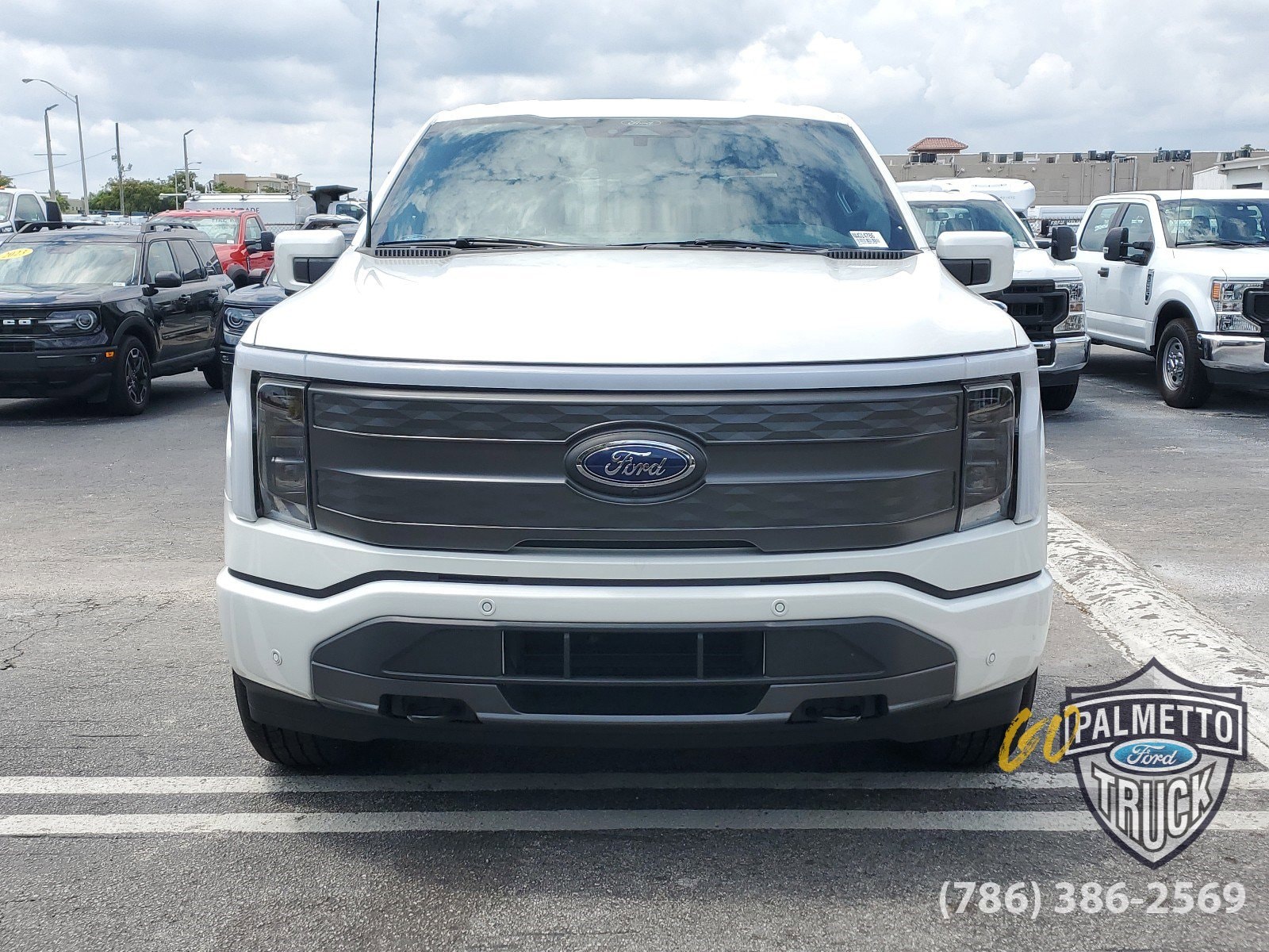 Used 2022 Ford F-150 Lightning Lariat with VIN 1FTVW1EL7NWG14786 for sale in Miami, FL