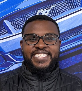 Staff member Ishmar Dawkins from f5ecbddf9ddd