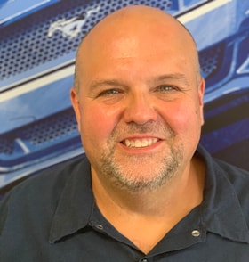 Staff member John Torok from a090fae96921