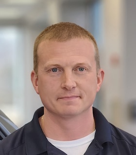 Staff member Joel Wallace from 543475a45e8b