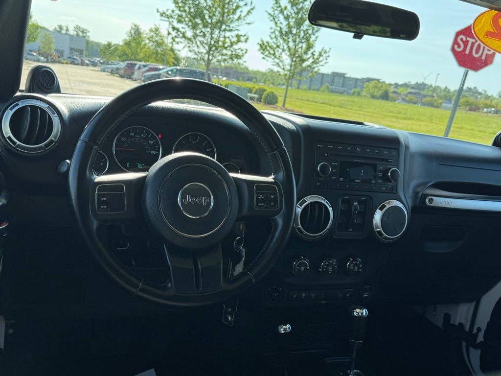 Used 2012 Jeep Wrangler Unlimited Sahara with VIN 1C4BJWEG5CL133449 for sale in Starkville, MS