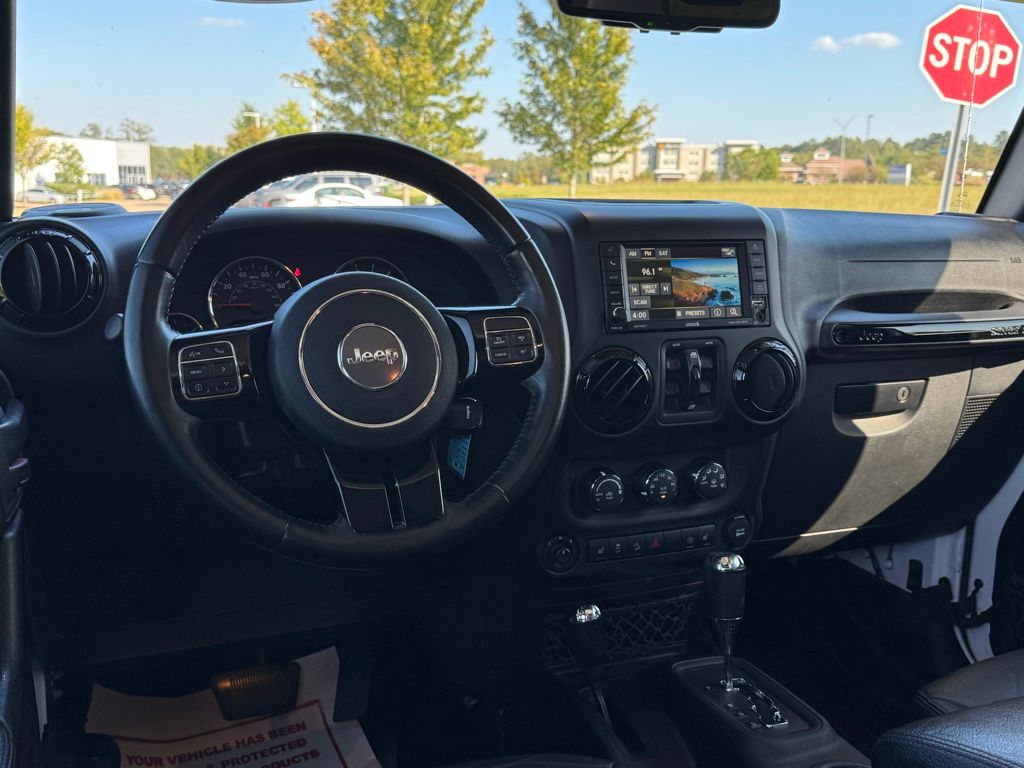 2015 Jeep Wrangler Unlimited Sahara Altitude photo 3