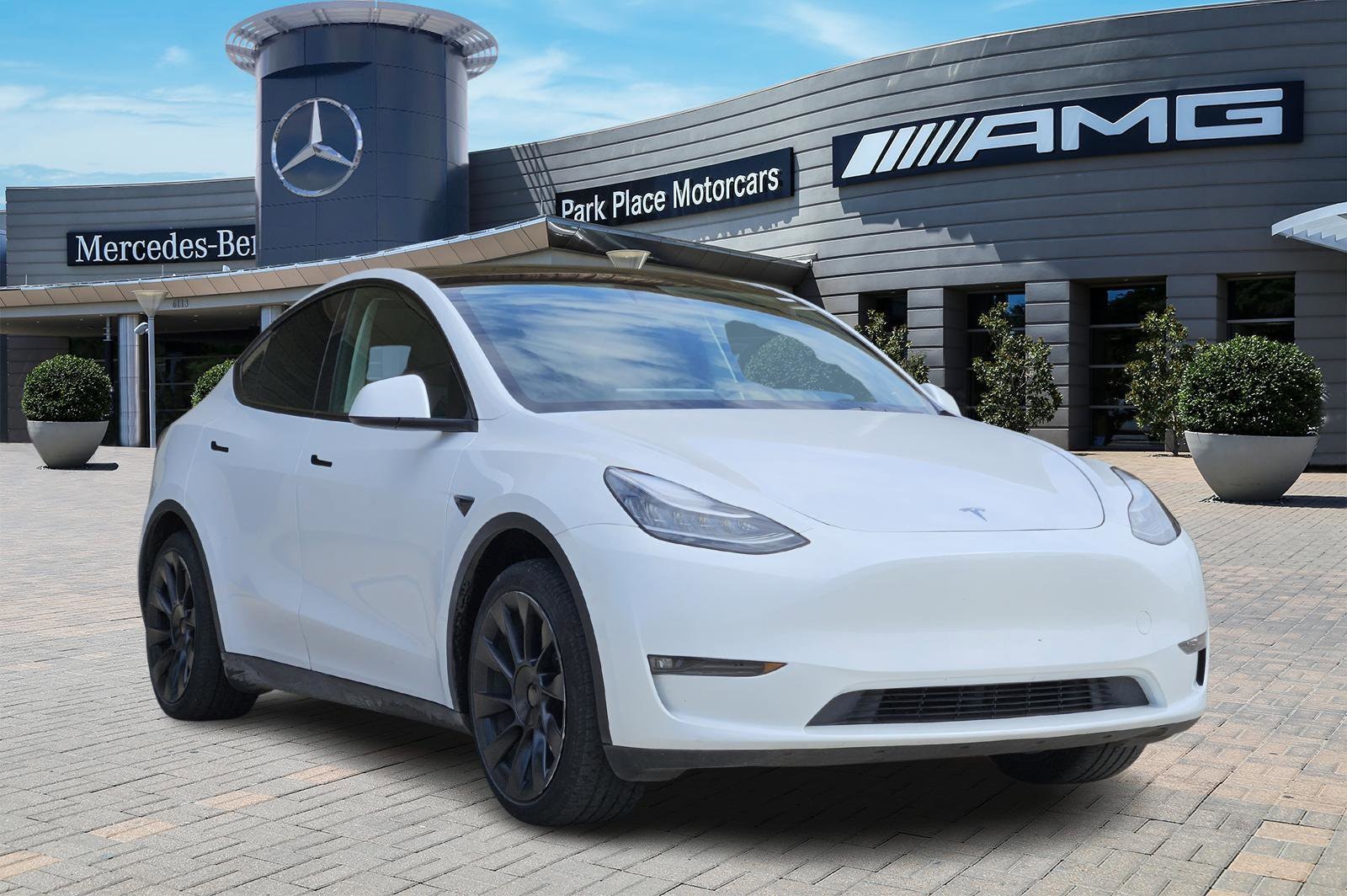 Used 2023 Tesla Model Y Long Range with VIN 7SAYGAEE8PF611322 for sale in Dallas, TX