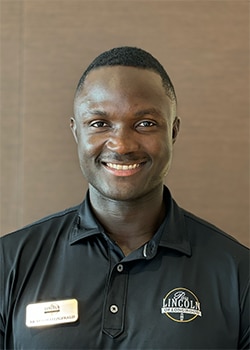 Staff member AB Abadi-Fitzgerald from a580bee28eba