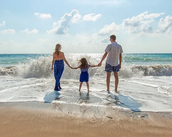 Family enjoying a beach getaway