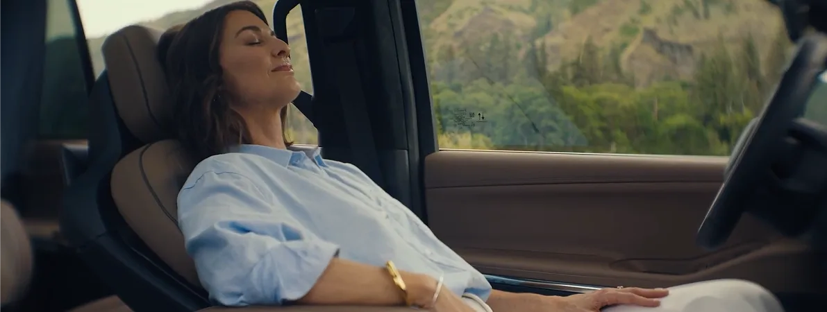 Passenger relaxing in a Lincoln Navigator Black Label seat